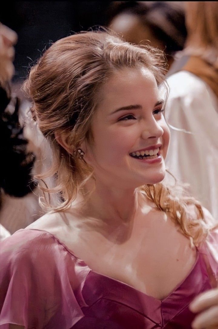 Hermione laughing in her yule ball dress
